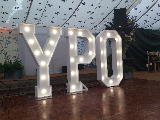 YPO in floral marquee.jpg